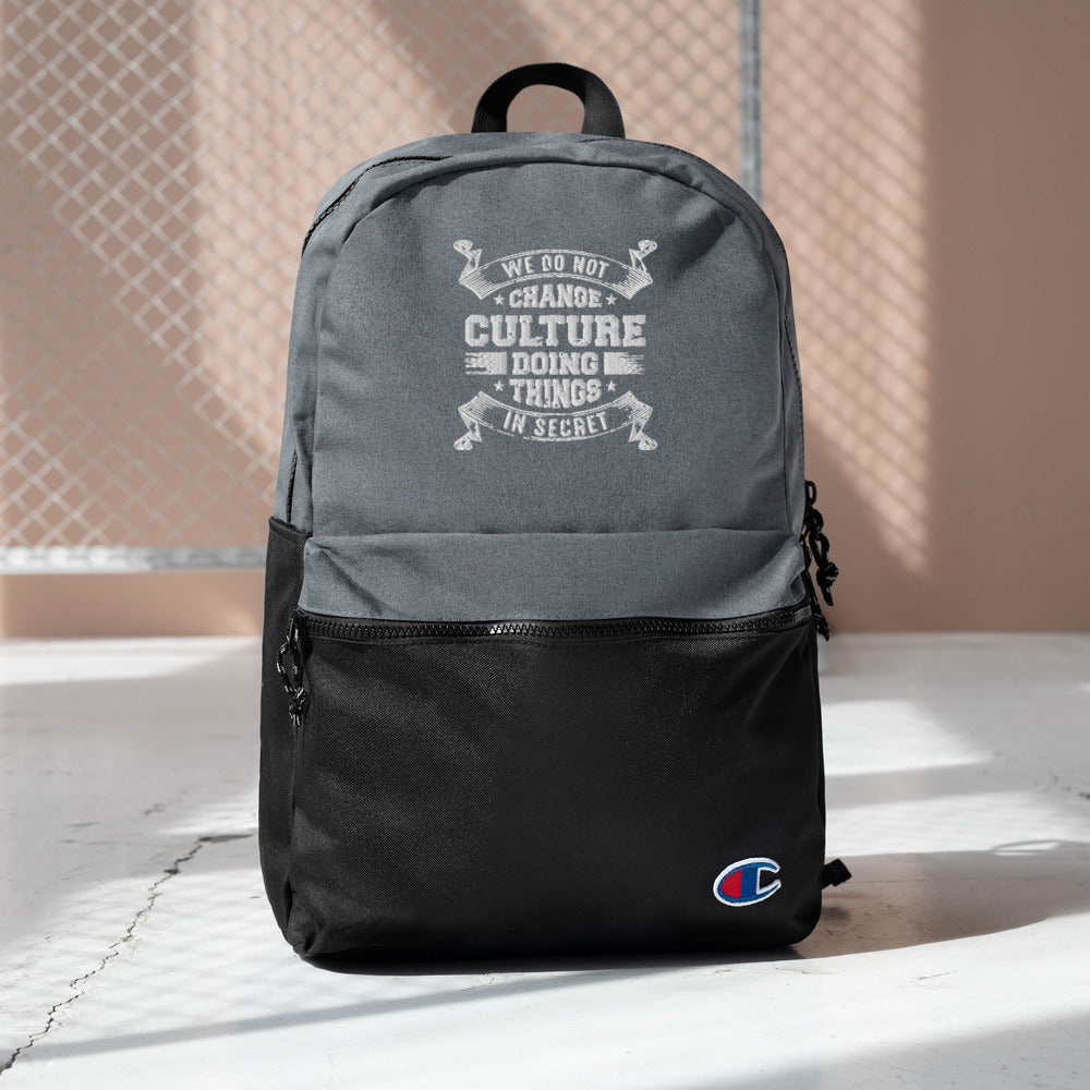 We Do not Change Culture Doing Things In Secret ( Acts 13:47) Champion Backpack